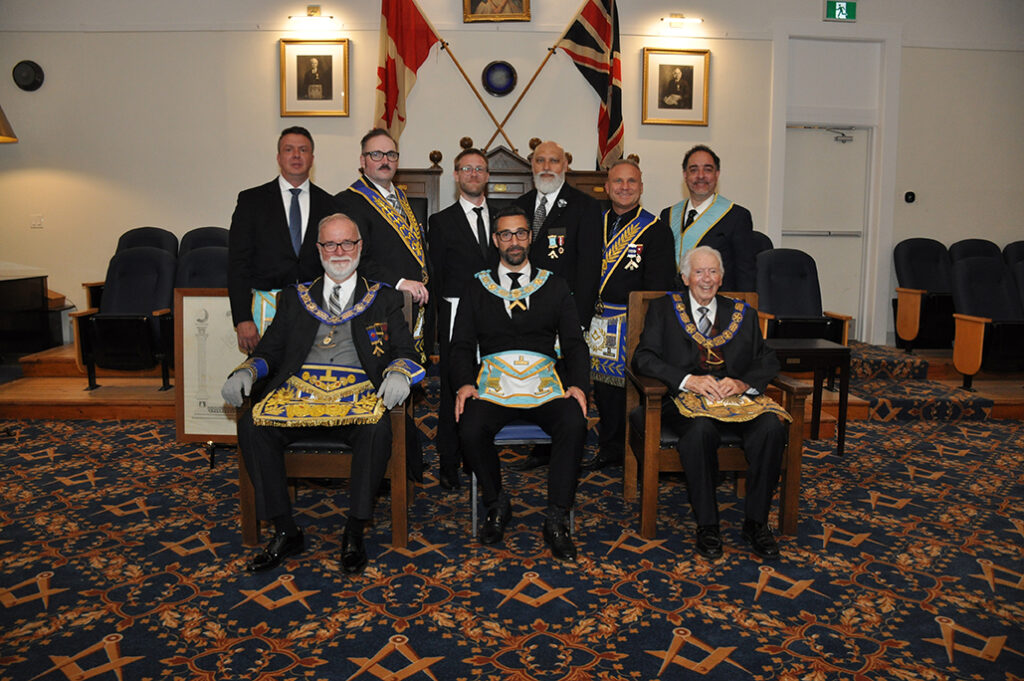 The planning committee of the Weston Masonic Temple and Humber Lodge Anniversary celebrations with the current and former Grand Masters.